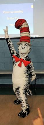 PHOTOS BY VERA OLINSKI The Cat in the Hat leads Walnut Ridge Primary School in the Keep on Reading song.