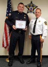 Sergeant Erich Olsen is shown with Sussex County Sheriff Michael F. Strada