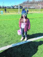 Madison Kammerer, 5, of Vernon wears bunny glasses at the annual Easter Egg Trail at Maple Grange Park.