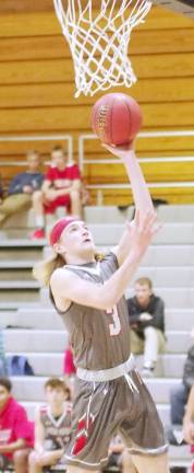 High Point's Connor Lake moves the ball towards the hoop during a shot in the third quarter. Lake scored 10 points.