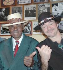 Peter Karp (right), an internationally known musician who got his start at The Stanhope House, is pictured with the late great blues pianistJoe Willie Pinetop Perkins in The Stanhope House lobby. Photo provided.
