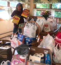 Linda Fuehrer, program chairperson of the Vernon Township Woman’s Club, displays more than $1,000 worth of groceries that the club collected in just one week for the food pantry at Family Promise of Sussex County.