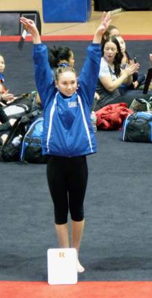 Giant Gymnastics performs well at Rutgers Color Games Danielle Bruce of Vernon was third on the uneven bars.