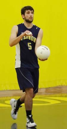 Vernon's Stephan Thomsen about to serve the ball.