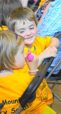 Future kindergartners introduced to school Kindergarten students enjoy one another.