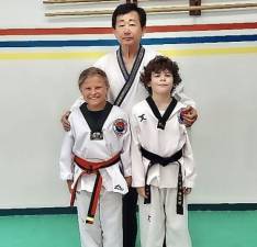 Alexa Baker received her junior black belt and Maximus LuCard Jr. received his black belt. They are both students at Universal Martial Arts in Lafayette.