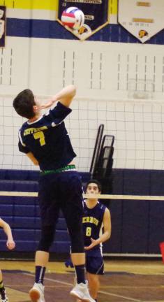 Jefferson's Liam Whalen leaps towards the ball. Whalen contributed 13 kills, 1 assist and 6 blocks.