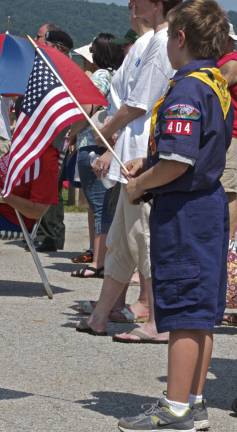 Scenes from Memorial Day in Vernon James Wtulich of Cub Scout Pack 404 holds his flag tightly as he watches the events at Memorial Park in Vernon on Memorial Day.