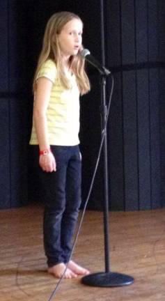 Determined mom brings back school's talent show Photos by Laurie Gordon Reagan DeCaro practices her solo from the movie "Frozen."