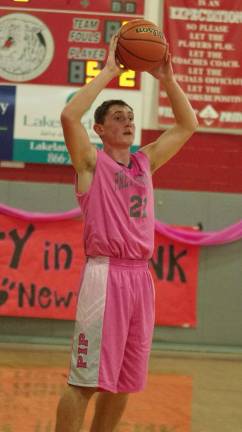 High Point boys win pretty in pink showcase Wallkill Valley's Dylan Harlos holds the ball as he scans the court for an open teammate.