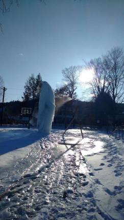 Winter Lights festival in Milford this weekend Tom Holmes's ice sculpture is taking shape at the Ann Street Park rink. “It’s a give and take between mother nature and Tom,” joked organizer Mike Carson. (Photo by Anya Tikka)