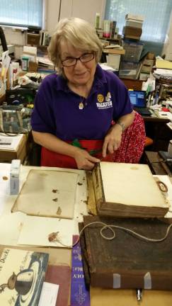 Turul Bookbindery bound for success Margit Rahill is shown at work.