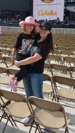 Bella Valerius is shown with her mother, Jennifer after a Luke Bryan concert at MetLife Stadium.