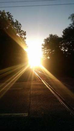 Photo courtesy Donald Wayne The sun rises along the railroad tracks near Sandhill Road in Vernon Township.