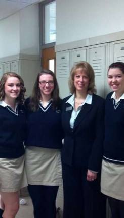 Sandberg visits Pope John school Danielle Fetherman, Olivia Fatica, Elaine J. Sandberg and Melynda Post are shown.