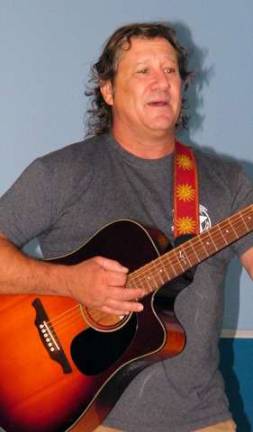 Sussex Elks remember 9/11 Songwriter and guitarist Tom Gomez with the band R.E.N.O. (Really Enjoyable Necessary Opportunities) performing original piece, ‘Flag of Heroes’ Thursday night for the 9/11 ceremony at Sussex Elks Lodge No. 2288.