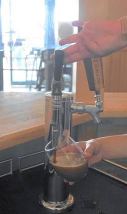 Coffee is serious business at Brother Beans Nitro Coffee is served from the tap at Smokey's Brick Oven Tavern.