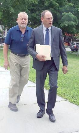 Court grants protection order to animal shelter worker Barry Heim and his attorney, Matthew Galasso, walk toward the Pike County Courthouse (Photo by Frances Ruth Harris)