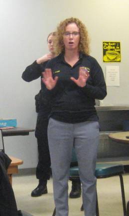 Woman's Club learns to handle 'active shooter' situations PHOTOS BY JANET REDYKE Hillary Manser, assistant to Sheriff Michael Strada, stresses the seriousness of active shooter response.