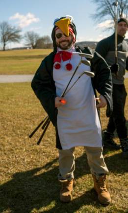 Joseph Tanan is dressed for cold weather at the fundraiser for Project Self-Sufficiency.