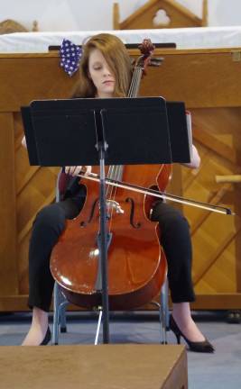 Choral Society holds concert Guest cellist Victoria Meneses, 16, played a selection of patriotic-themed selections.