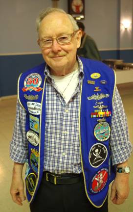 Sussex Elks hosts Armed Forces Day Well-decorated in more ways than one is Jim þÄúStogieþÄù Adams, a Sussex Elks Trustee and 10-year veteran of the United States Navy Submarine Service. The names of the ships on which he served were clearly detailed on the back of his vest. Adams is a resident of Wantage. He served in the Navy from the Korean War through the cold war and into the beginning of the Vietnam War period.