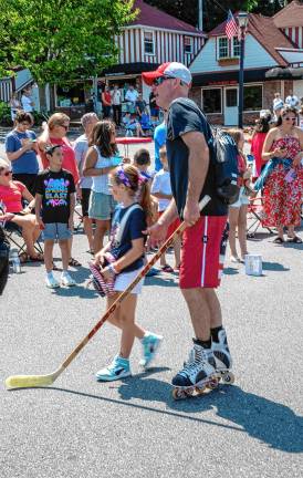 Sparta. Fourth of July events Members of the Sparta Roller Hockey Club take part in the parade.