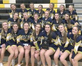 The Varsity Competition Cheer Team won first place at the West Milford Competition in their division and were overall grand champions.
