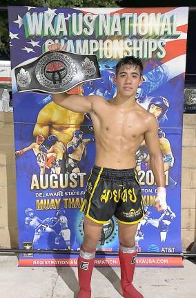 Teen kick boxer challenged by weightier opponents, emerges a champion Daniel Roque beat the odds to win his championship belt (Photo provided)