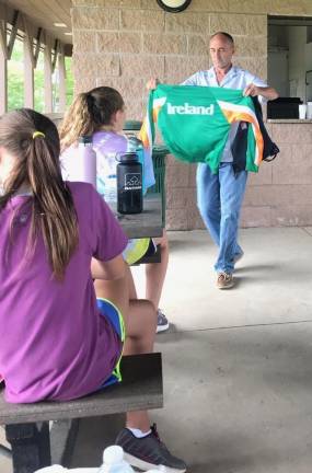 Marcus O'Sullivan shows one of his garmets from his competition days to the campers.