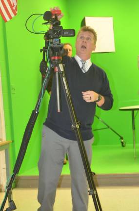 High Point school showcases technology Instructor Kevin Fenlon explains how his classes live stream events.