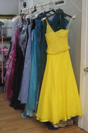 PHOTOS BY JANET REDYKEProm dresses collected by Gina Dobrowolski of The Daily Bean and Barbara Sklar were available for selection at the Barbara Sklar Studio in the Vernon Colonial Plaza.