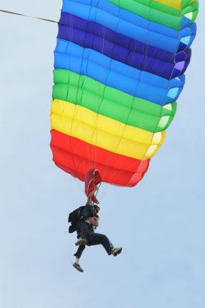 Not a bird, not a plane ... Ilya Ladyzhensky from Wantage, jumps with Desiree Larson from New York City. Photo by Nicholas Ortiz