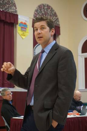 Photo by Vera Olinski Curriculum Coordinator Patrick Higgins reviews current and future goals with the Sussex-Wantage Board of Education at a recent meeting.