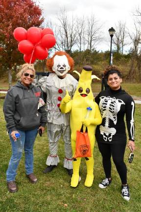 Vernon holds trick or trail event <b>Alex Agilera, Isaac Silva (banana and Dania Ortiz pose with Pennywise.</b>
