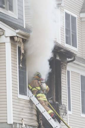 Structure Fire Photo by Robert G. Breese Fire Departments from Beemerville, Colesville, Montague, Franklin, Vernon, Sussex, and Branchville in New Jersey and Port Jervis, Unionville and Greenville in New York, along with local EMS and New Jersey State Police were on the scene of a working fire in a multifamily dwelling on Spring Hollow Road in Wantage at 12:20 p.m. Tuesday afternoon March 25.
