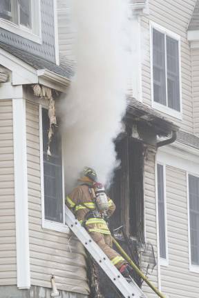 Photo by Robert G. Breese Fire Departments from Beemerville, Colesville, Montague, Franklin, Vernon, Sussex, and Branchville in New Jersey and Port Jervis, Unionville and Greenville in New York, along with local EMS and New Jersey State Police were on the scene of a working fire in a multifamily dwelling on Spring Hollow Road in Wantage at 12:20 p.m. Tuesday afternoon March 25.