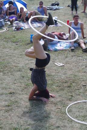 Hula-hoops of various sizes and forms and forms of execution were everywhere at Farm Fest 2014.