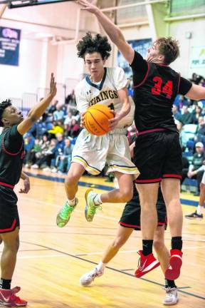 Junior guard Alex Fessel goes airborne. He scored a career-high 29 points in the championship game.