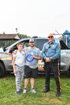 Photos: National Night Out in Sussex County Conner Trossman and Bill Gusta of Vernon pose with Hardyston police Sgt. Alan Carbery at National Night Out in Franklin.