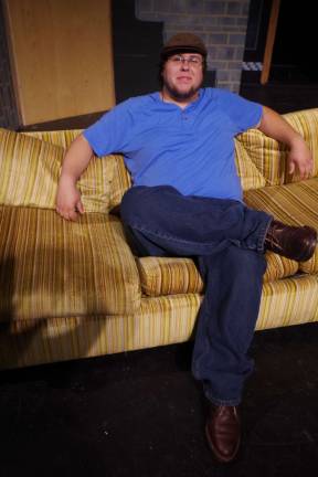 The play&#xfe;&#xc4;&#xf4;s director Tim Chenard of Newton takes a break on the set of The Odd Couple.