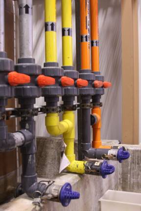 A look behind the scenes inside the water plant Each color indicates a different chemical.