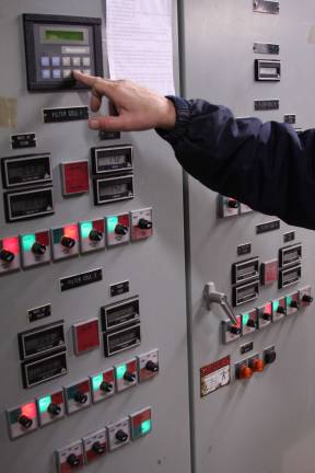 A look behind the scenes inside the water plant The plant manager points out how the settings that stagger the time between each treatment step can be altered as necessary.