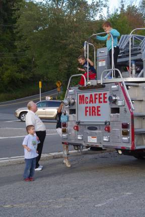 McAfee FD hosts 3rd annual pig roast Kids got to explore the fire engines.