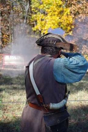 Armed with a musket, re-enactor Dennis Moore of Secaucus spent much of Sunday afternoon on the range at High Breeze Farm on Vernon&#x2019;s Wawayanda Mountain.