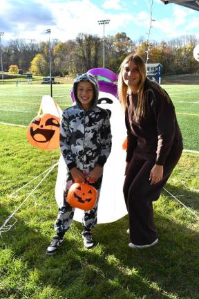 Vernon holds trick or trail event <b>Kaitlyn Sullivan and Noah Sullivan stand in front of an inflatable ghost.</b>