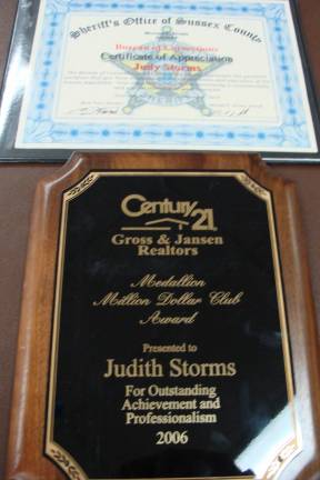 Some of the many awards and citations Judy Storms has achieved over her years of service.