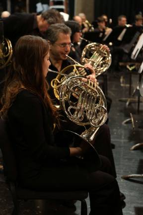 Vernon high school orchestra rehearses with pros Allie Specht on French Horn