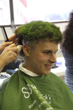 From big and green to smooth and clean, Eric Stahl of Franklin raised $350 for his buzz cut to help the St. Baldricks fundraiser.