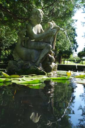 Water from one of the numerous fountains at Meadowburn Farm is reflected in the pool below.